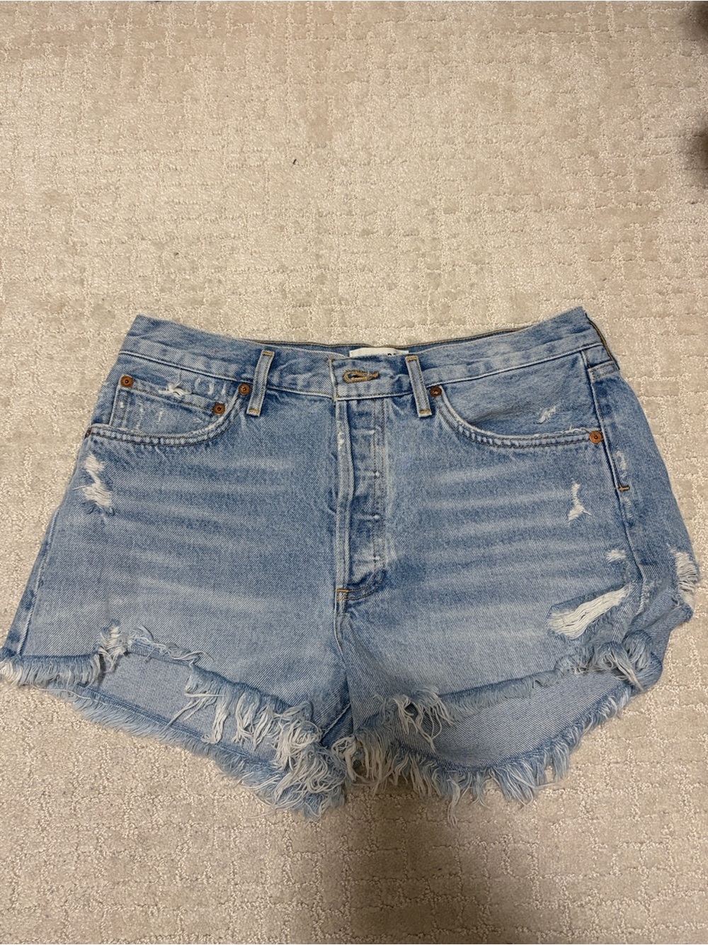 Agolde Parker Long Light Blue Distressed Denim Shorts